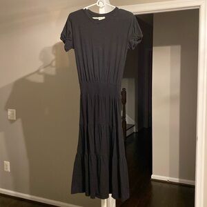 Nation LTD Black dress with wide elastic waist and tiered bottom.